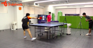 Backhand topspin on the table