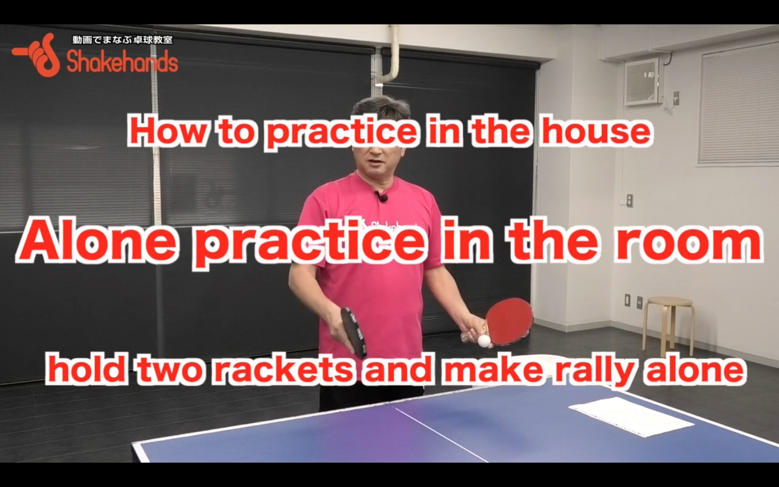 take rackets with both hands and make rally